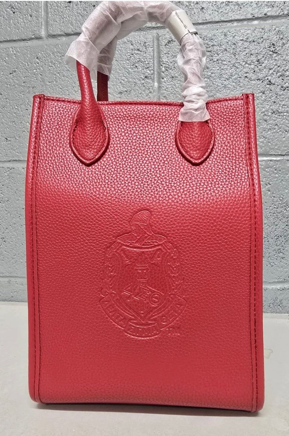Delta Sigma Theta embossed crossbody bag